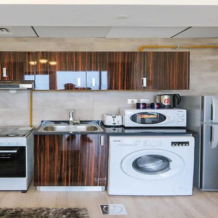 Oyo 860 Studio Apartment, Maya Tower 4, Jumeirah Village Triangle Ντουμπάι Εξωτερικό φωτογραφία