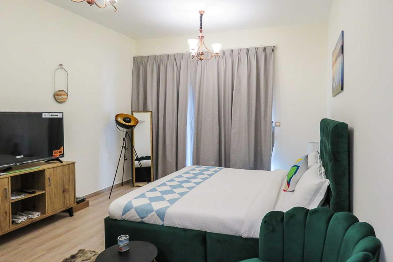 Oyo 860 Studio Apartment, Maya Tower 4, Jumeirah Village Triangle Ντουμπάι Εξωτερικό φωτογραφία